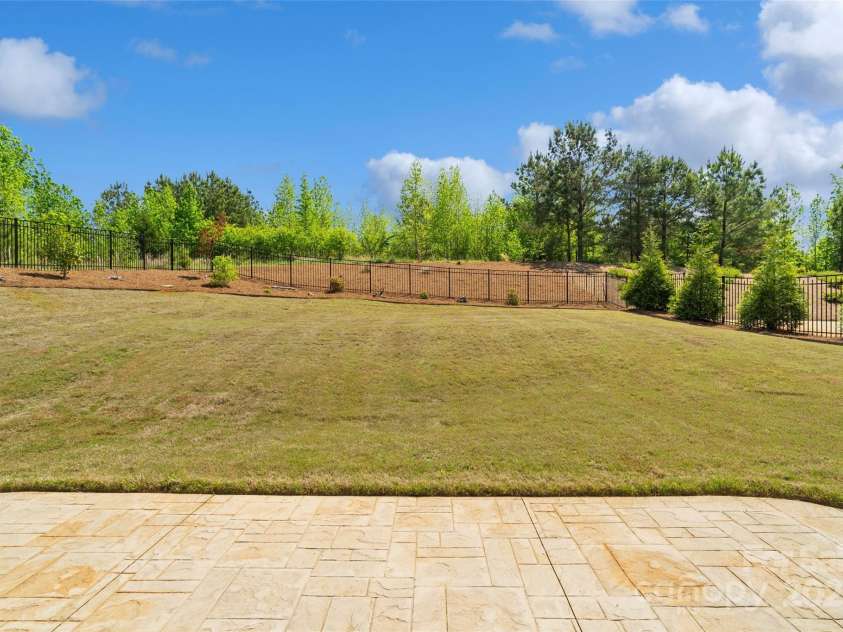 10270 Lakeshore Drive, Lancaster, SC 29720.  MLS# CAR4240067, YatesRealty ID 16567. Stamped Concrete Rear Patio and Backyard