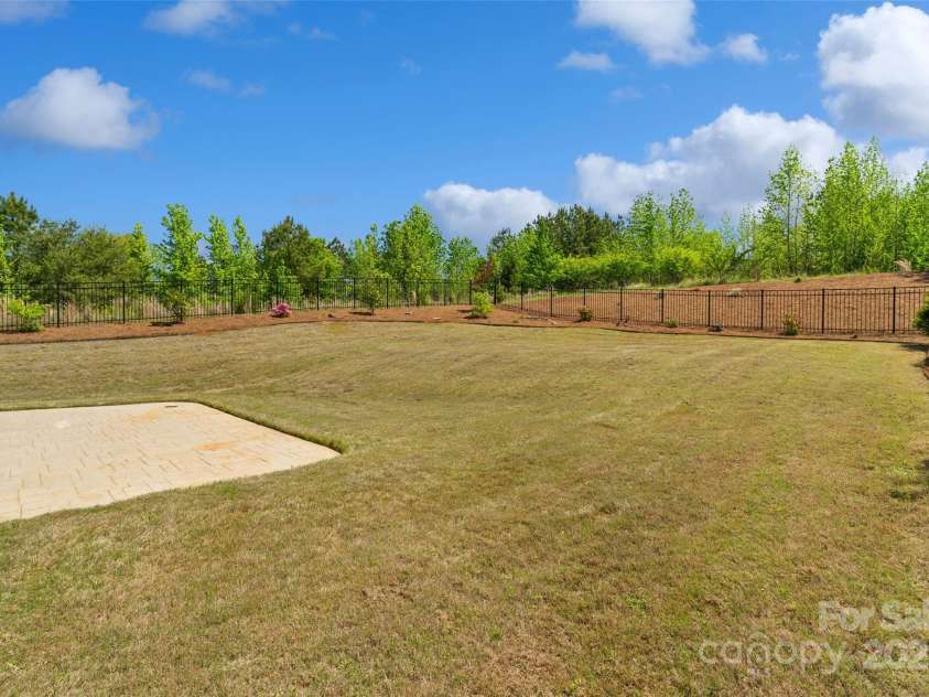 10270 Lakeshore Drive, Lancaster, SC 29720.  MLS# CAR4240067, YatesRealty ID 16567. Stamped Concrete Rear Patio and Backyard