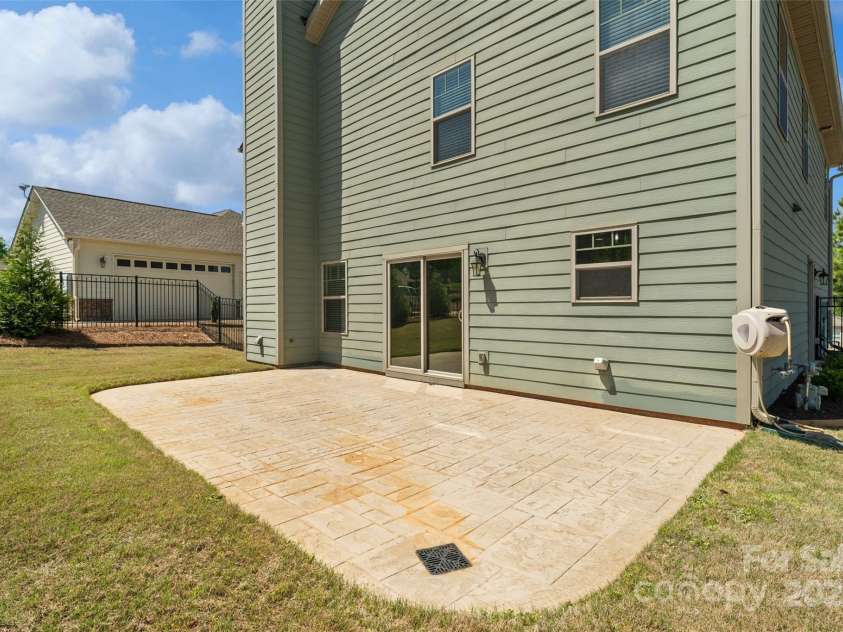 10270 Lakeshore Drive, Lancaster, SC 29720.  MLS# CAR4240067, YatesRealty ID 16567. Stamped Concrete Rear Patio and Backyard