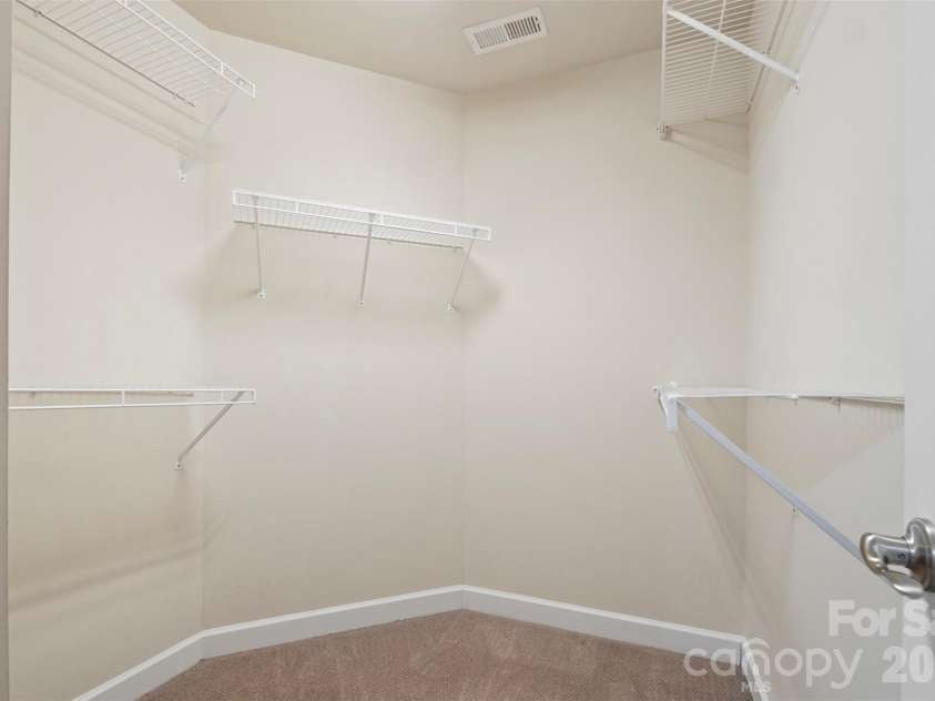 5518 Prosperity View Drive, Charlotte, NC 28269.  MLS# CAR4333321, YatesRealty ID 16568. Master closet 