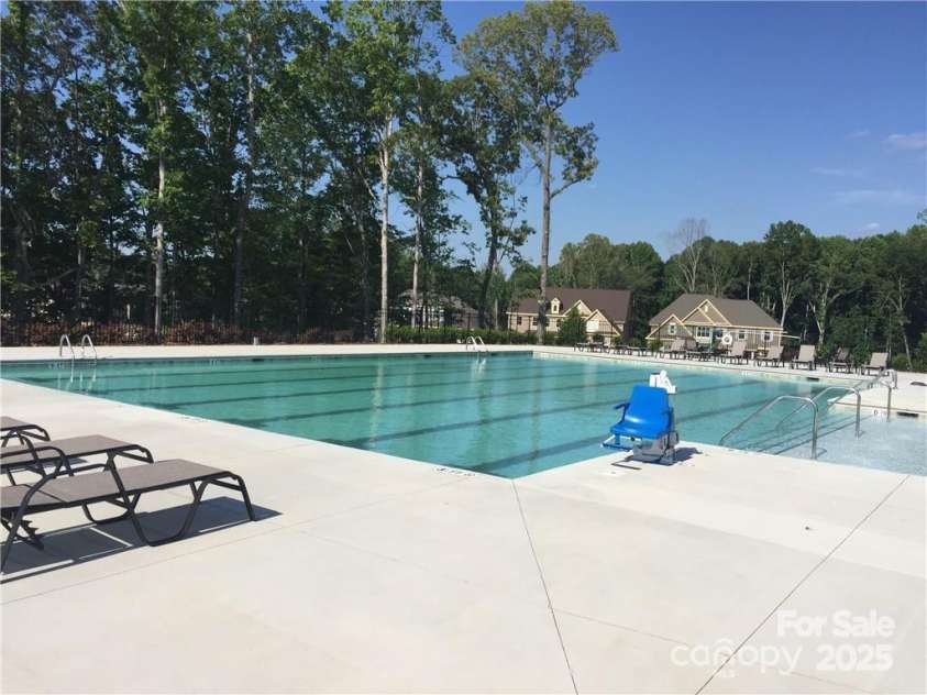 435 Galbreath Court, Fort Mill, SC 29708.  MLS# CAR4261565, YatesRealty ID 16571. Brayden pool with covered shade