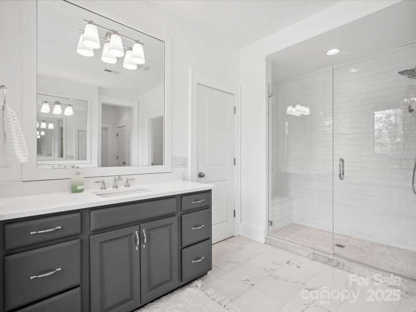 435 Galbreath Court, Fort Mill, SC 29708.  MLS# CAR4261565, YatesRealty ID 16571. Luxury Primary bathroom with 2 large closets