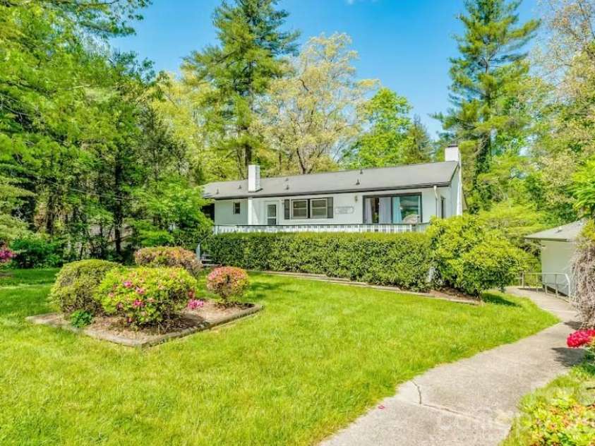 115 Old Mill Road, Flat Rock, NC 28731.  MLS# CAR4375477, YatesRealty ID 16575. #401 upper 3 bedroom unit