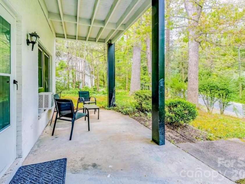 115 Old Mill Road, Flat Rock, NC 28731.  MLS# CAR4375477, YatesRealty ID 16575. 402 lower porch