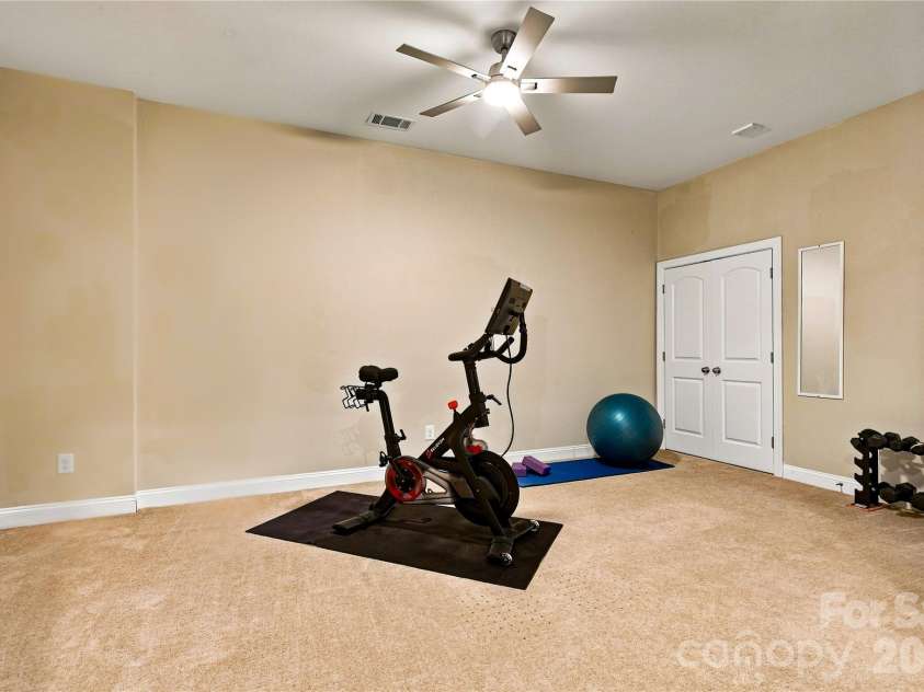 109 Athens Court, Mooresville, NC 28115.  MLS# CAR4413140, YatesRealty ID 16577. Exercise room in basement