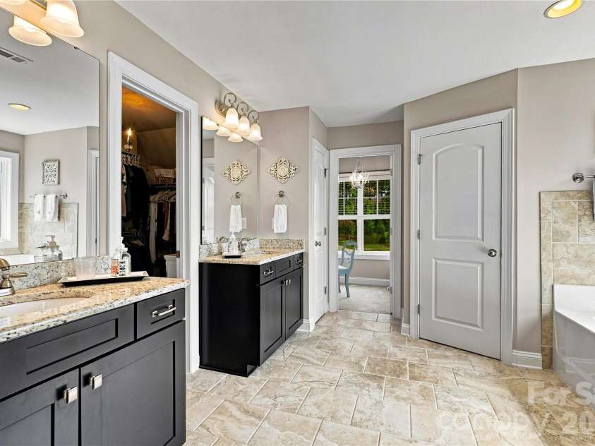 109 Athens Court, Mooresville, NC 28115.  MLS# CAR4413140, YatesRealty ID 16577. Generous primary bathroom with separate vanities
