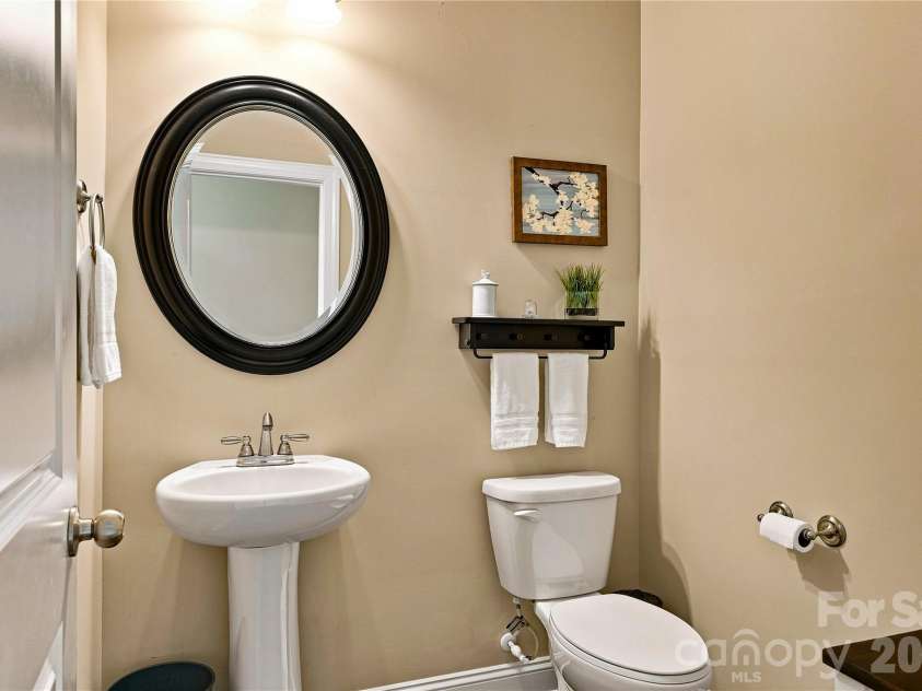 109 Athens Court, Mooresville, NC 28115.  MLS# CAR4413140, YatesRealty ID 16577. Main level half bath