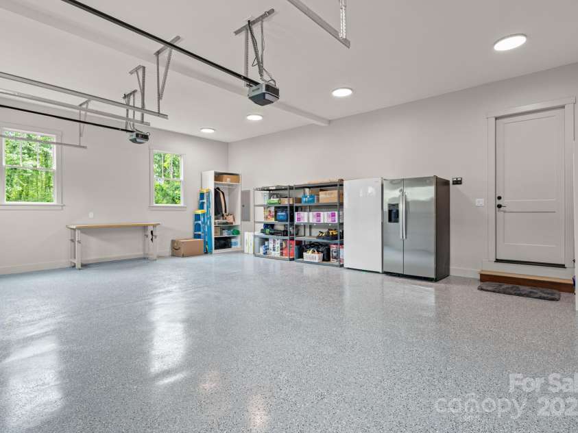301 Rockbridge Road, Mills River, NC 28759.  MLS# CAR4265913, YatesRealty ID 16585. 2 car garage with work space