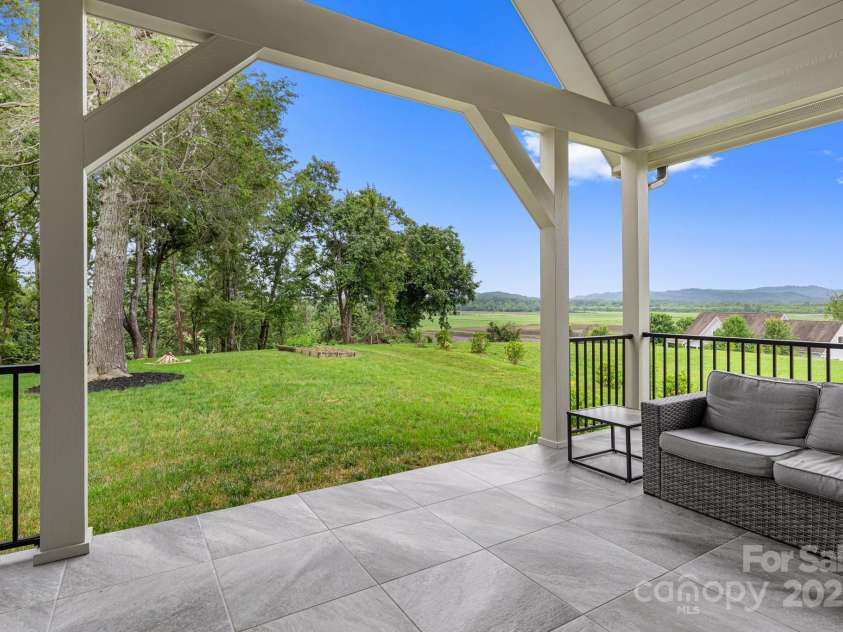 301 Rockbridge Road, Mills River, NC 28759.  MLS# CAR4265913, YatesRealty ID 16585. Back Porch with View