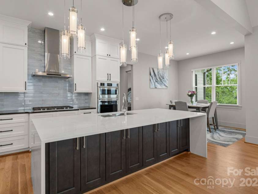 301 Rockbridge Road, Mills River, NC 28759.  MLS# CAR4265913, YatesRealty ID 16585. Kitchen looking into Breakfast Area