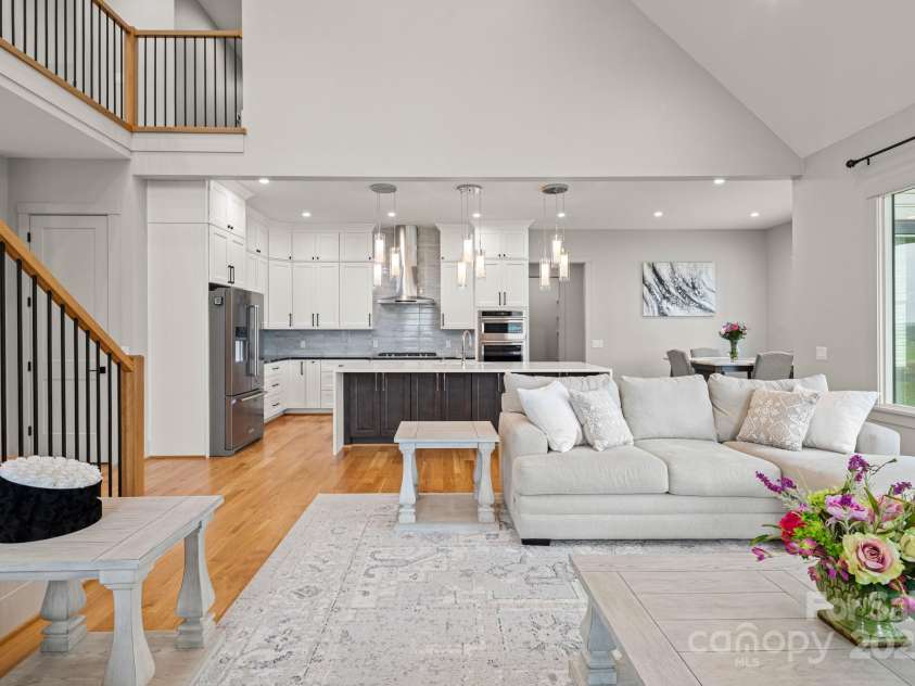 301 Rockbridge Road, Mills River, NC 28759.  MLS# CAR4265913, YatesRealty ID 16585. Living Room looking into kitchen