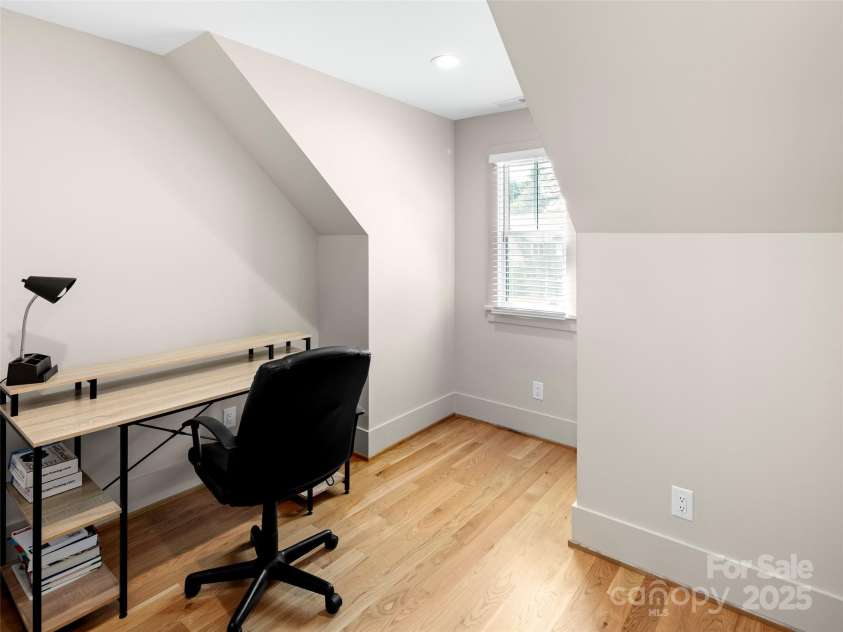 301 Rockbridge Road, Mills River, NC 28759.  MLS# CAR4296357, YatesRealty ID 16585. Cozy office space at the top of the stairs