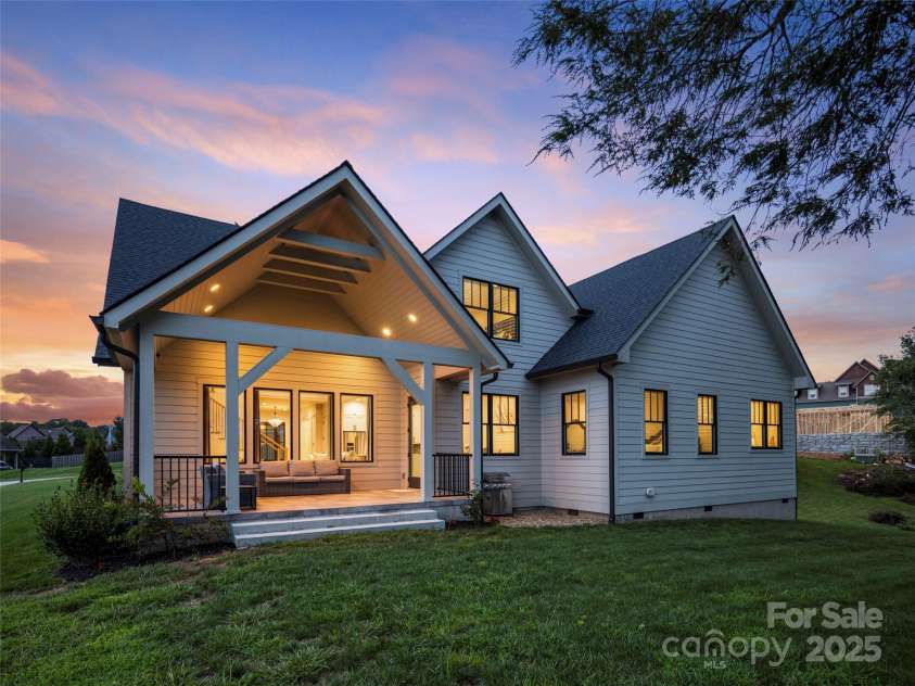 301 Rockbridge Road, Mills River, NC 28759.  MLS# CAR4296357, YatesRealty ID 16585. This home is stunning day or night!