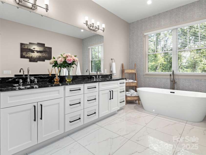 301 Rockbridge Road, Mills River, NC 28759.  MLS# CAR4296357, YatesRealty ID 16585. Vast owners bath with double insulated exterior walls.