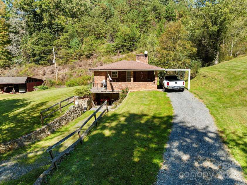 1623 Ammons Branch Road, Marshall, NC 28753.  MLS# CAR4307032, YatesRealty ID 166. Upper & lower driveways for parking
