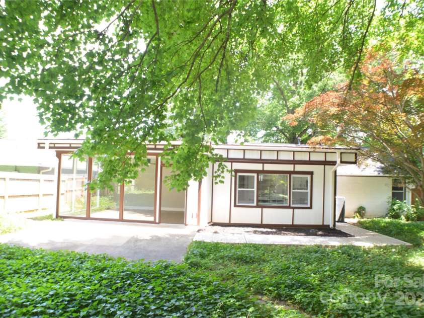2000 Tyvola Road, Charlotte, NC 28210.  MLS# CAR4260481, YatesRealty ID 16600. Enjoy the serenity of a privately fenced backyard—your own peaceful retreat away from the hustle and bustle of everyday life.