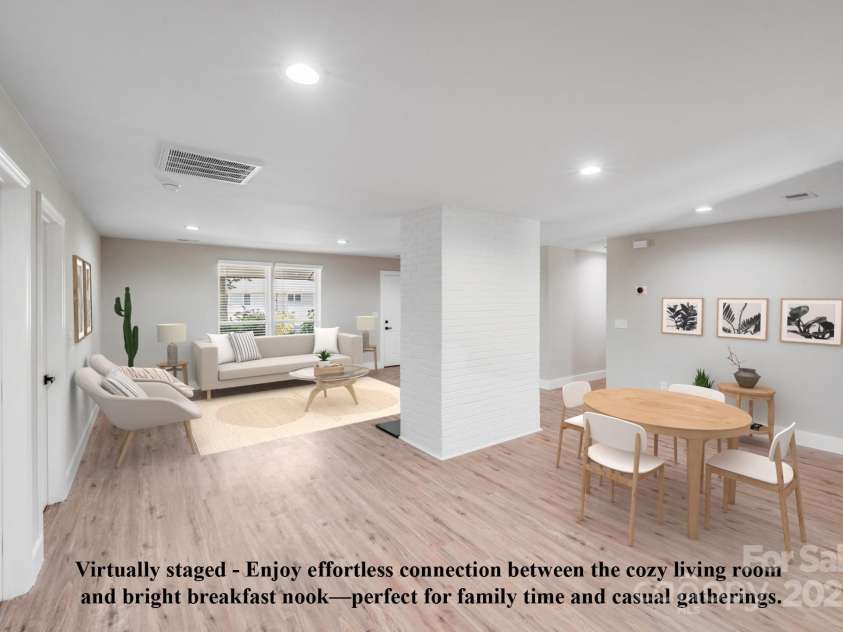 2000 Tyvola Road, Charlotte, NC 28210.  MLS# CAR4260481, YatesRealty ID 16600. Virtually staged - Enjoy effortless connection between the cozy living room and bright breakfast nook—perfect for family time and casual gatherings.