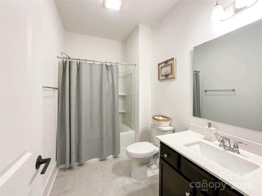 2048 Turnsberry Drive, Monroe, NC 28112.  MLS# CAR4258909, YatesRealty ID 16605. Downstairs full bath