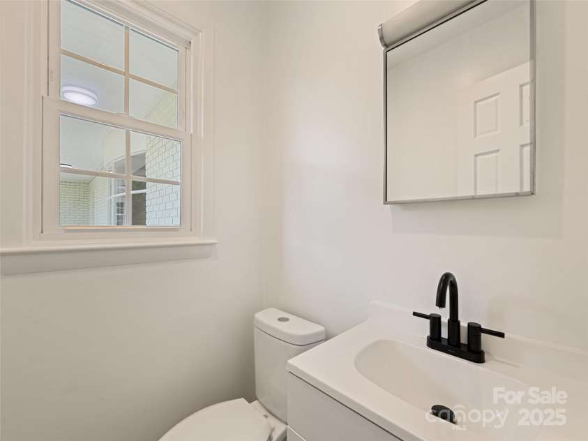 106 Whispering Hills Drive, Hendersonville, NC 28792.  MLS# CAR4251475, YatesRealty ID 16616. 1/2 bath