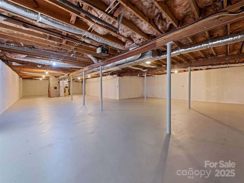 106 Whispering Hills Drive, Hendersonville, NC 28792.  MLS# CAR4251475, YatesRealty ID 16616. Basement