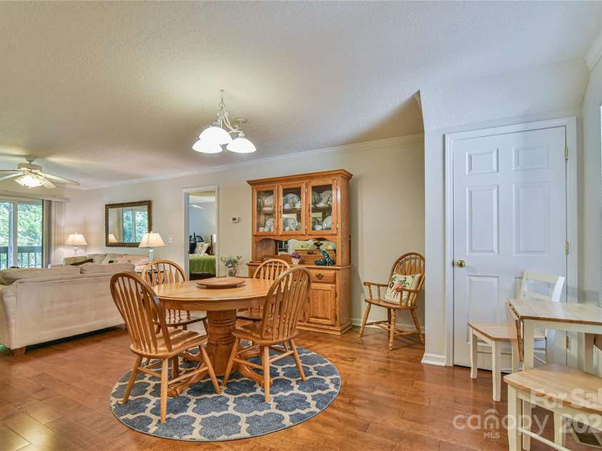 102 Waters Edge Drive, Weaverville, NC 28787.  MLS# CAR4264421, YatesRealty ID 16619. Dining Area and Living Room