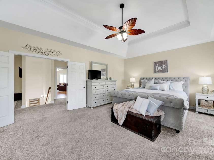 1569 Benjamen Latrobe Circle, Fort Mill, SC 29708.  MLS# CAR4235857, YatesRealty ID 16622. Primary Bedroom - Tray Ceiling, Plantation Shutters
