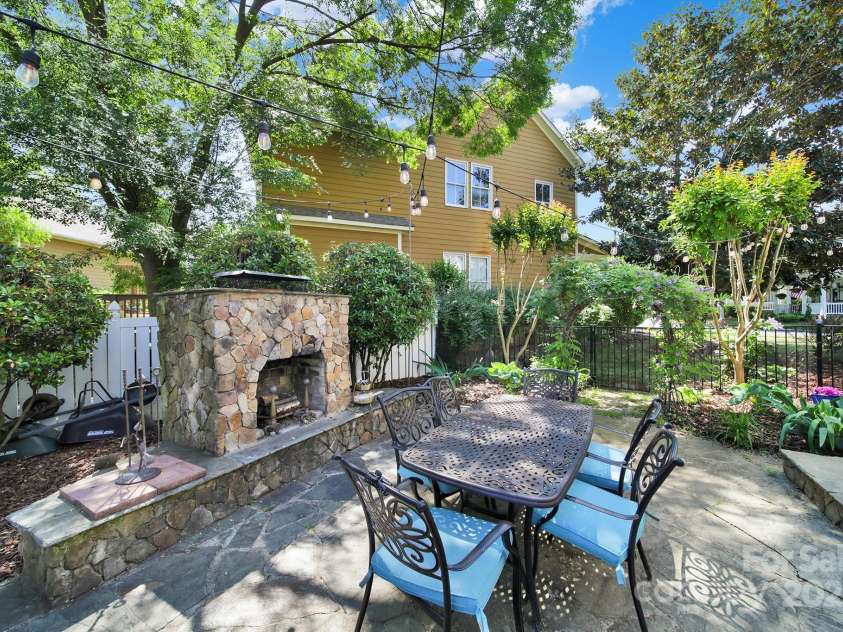 1569 Benjamen Latrobe Circle, Fort Mill, SC 29708.  MLS# CAR4235857, YatesRealty ID 16622. Stacked Stone Wood Burning Fireplace, Stone Patio off Breakfast Room