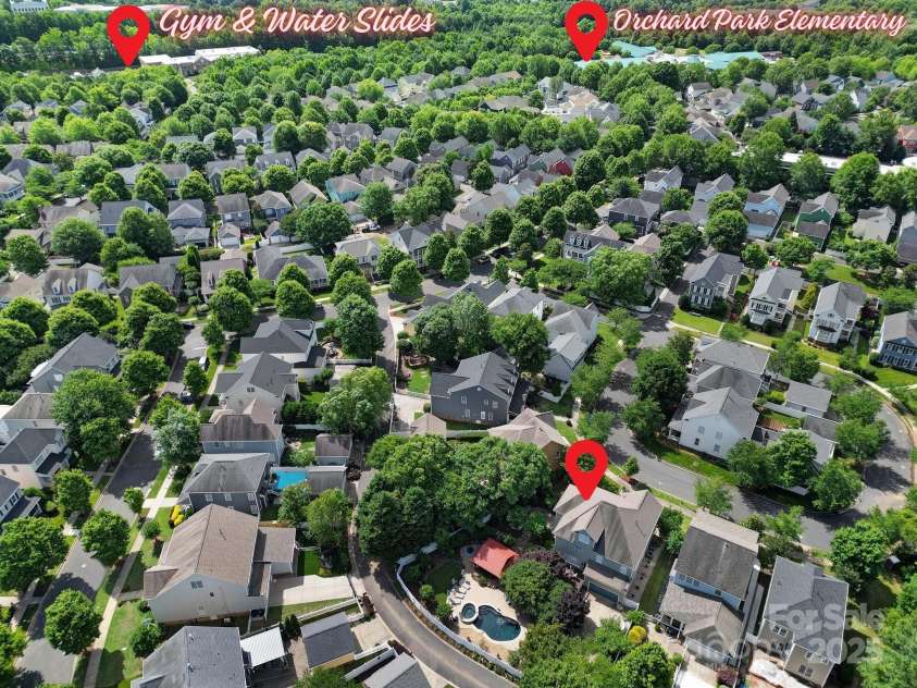 1569 Benjamen Latrobe Circle, Fort Mill, SC 29708.  MLS# CAR4235857, YatesRealty ID 16622. Walk to Gym, School, Town Center - Shops, Restaurants, Library, Yoga, & More (3 Blocks)
