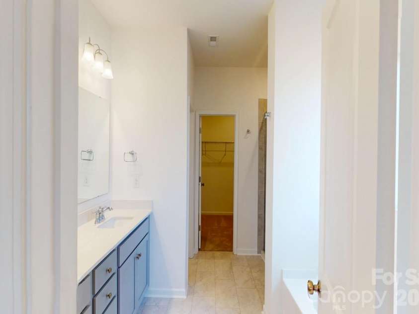 1320 Fremont Drive, Wingate, NC 28174.  MLS# CAR4326662, YatesRealty ID 16623. Owners bathroom