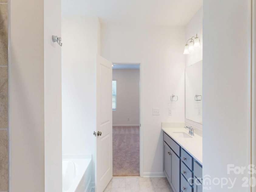 1320 Fremont Drive, Wingate, NC 28174.  MLS# CAR4326662, YatesRealty ID 16623. Owners bathroom