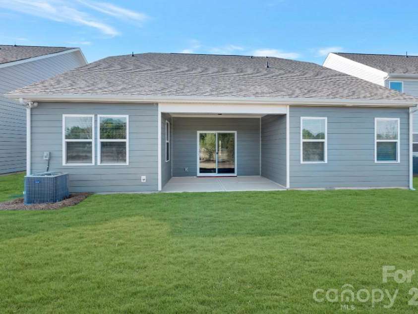 1320 Fremont Drive, Wingate, NC 28174.  MLS# CAR4326662, YatesRealty ID 16623. Rear exterior