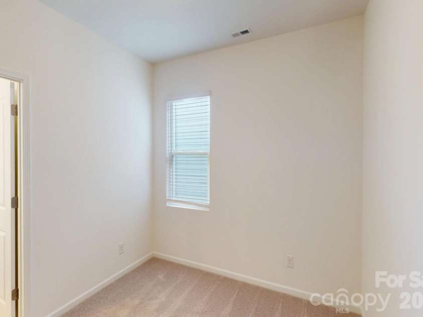 1320 Fremont Drive, Wingate, NC 28174.  MLS# CAR4326662, YatesRealty ID 16623. Secondary bedroom