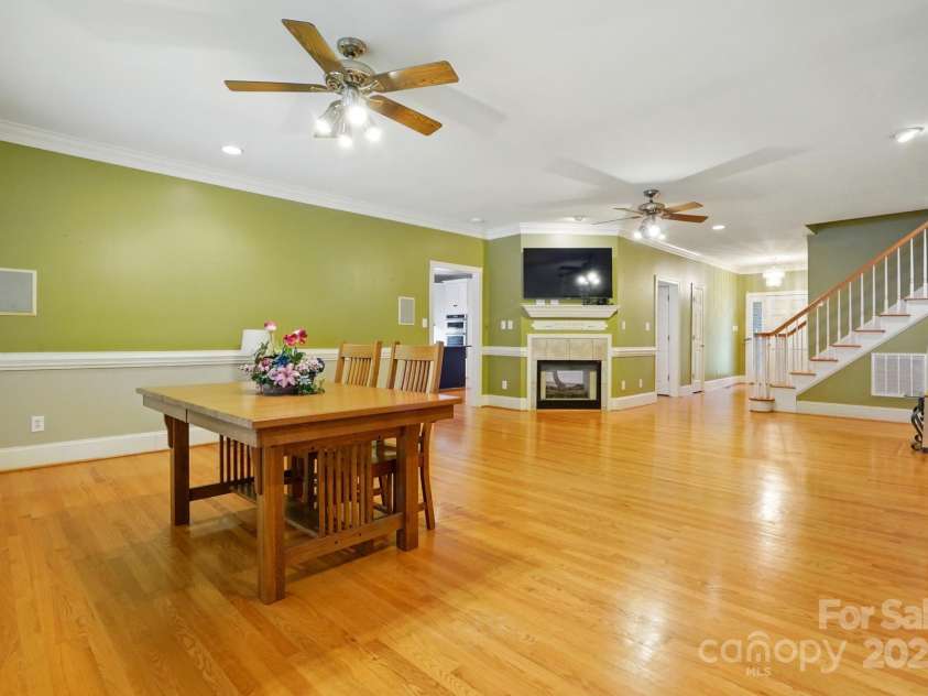 7725 Whitmire Lane, Mint Hill, NC 28227.  MLS# CAR4265038, YatesRealty ID 16623. Dining Area View into Family Room