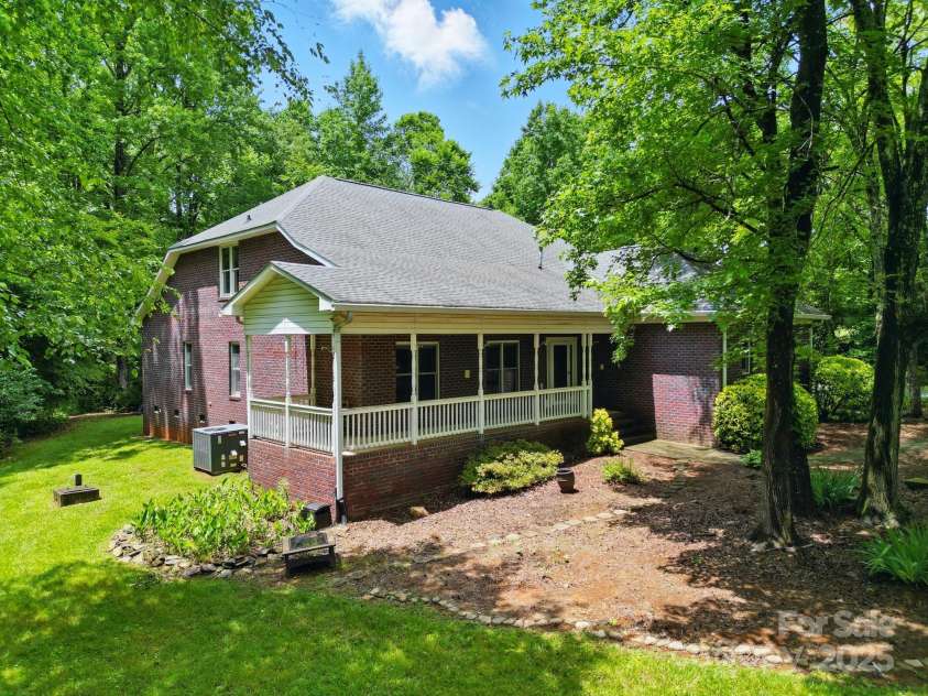 7725 Whitmire Lane, Mint Hill, NC 28227.  MLS# CAR4265038, YatesRealty ID 16623. Front Porch Angle