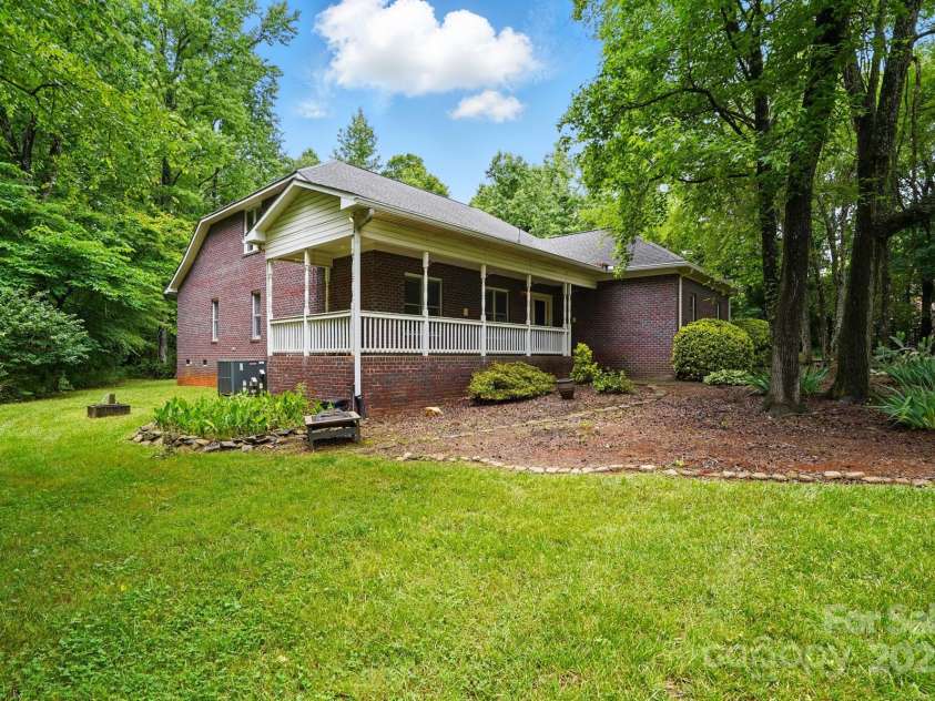 7725 Whitmire Lane, Mint Hill, NC 28227.  MLS# CAR4265038, YatesRealty ID 16623. Front Porch Angle