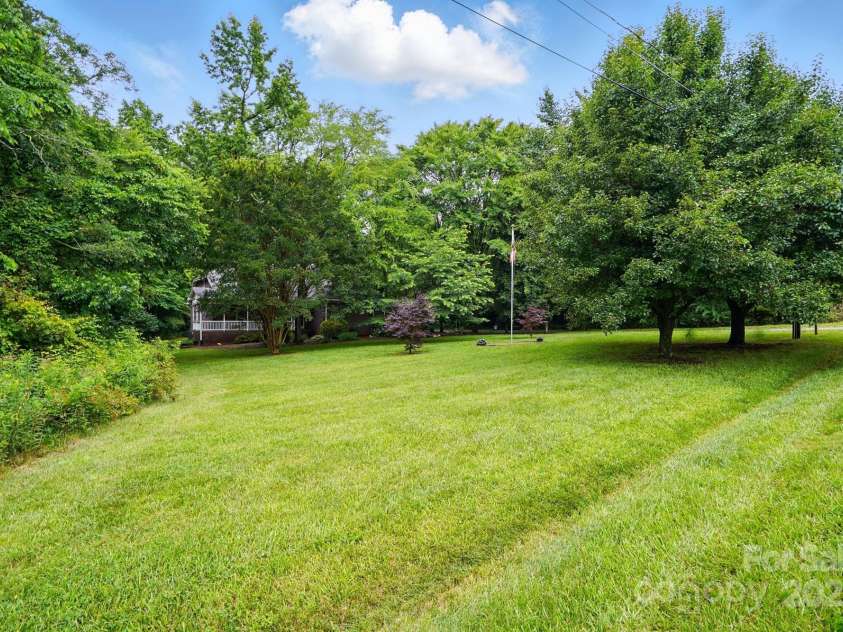 7725 Whitmire Lane, Mint Hill, NC 28227.  MLS# CAR4265038, YatesRealty ID 16623. Front Yard