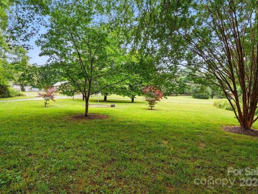 7725 Whitmire Lane, Mint Hill, NC 28227.  MLS# CAR4265038, YatesRealty ID 16623. Front Yard