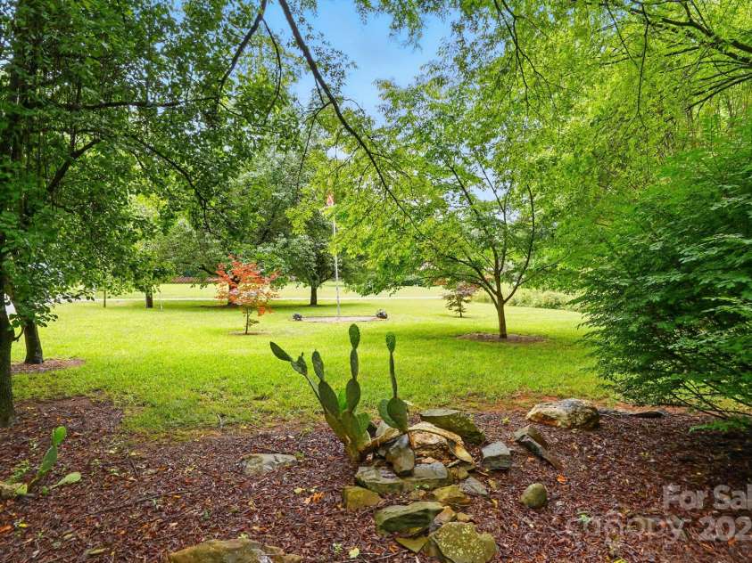 7725 Whitmire Lane, Mint Hill, NC 28227.  MLS# CAR4265038, YatesRealty ID 16623. Front Yard View