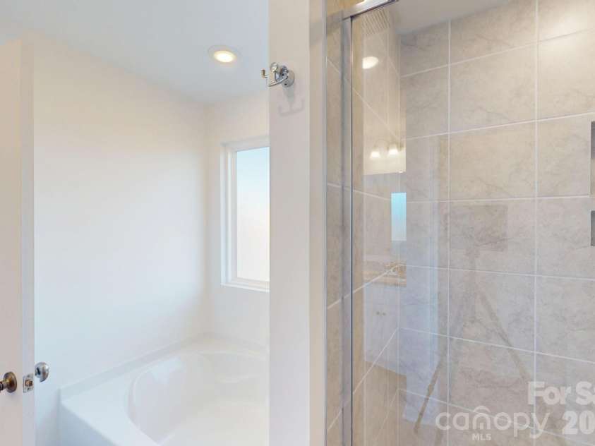 1330 Fremont Drive, Wingate, NC 28174.  MLS# CAR4330111, YatesRealty ID 16624. Owners bathroom