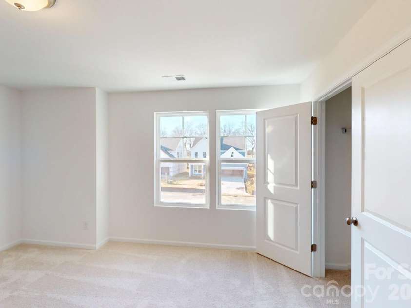 1330 Fremont Drive, Wingate, NC 28174.  MLS# CAR4330111, YatesRealty ID 16624. Secondary bedroom