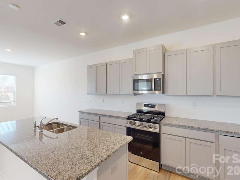 1334 Fremont Drive, Wingate, NC 28174.  MLS# CAR4337630, YatesRealty ID 16625. Kitchen