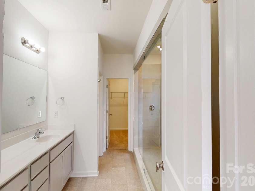 1334 Fremont Drive, Wingate, NC 28174.  MLS# CAR4337630, YatesRealty ID 16625. Owners bathroom