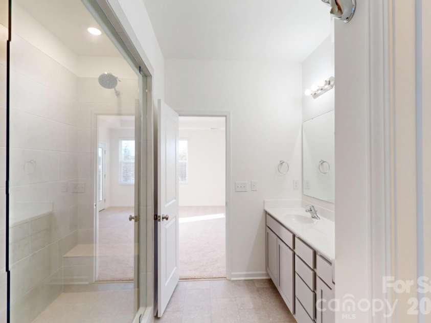 1334 Fremont Drive, Wingate, NC 28174.  MLS# CAR4337630, YatesRealty ID 16625. Owners bathroom