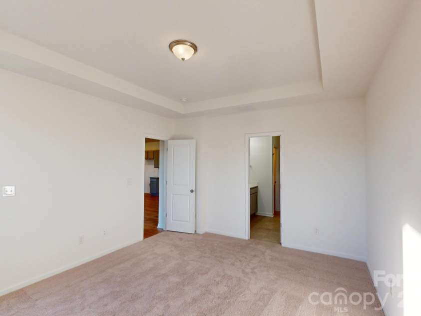 1334 Fremont Drive, Wingate, NC 28174.  MLS# CAR4337630, YatesRealty ID 16625. Owners bedroom
