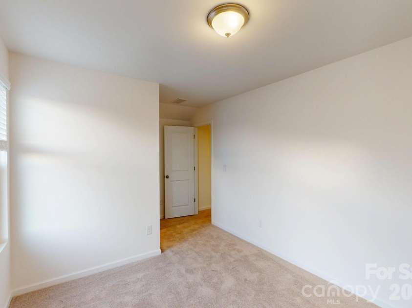 1334 Fremont Drive, Wingate, NC 28174.  MLS# CAR4337630, YatesRealty ID 16625. Second floor bedroom