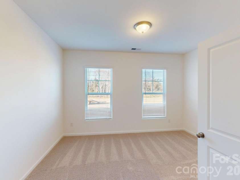 1334 Fremont Drive, Wingate, NC 28174.  MLS# CAR4337630, YatesRealty ID 16625. Secondary bedroom