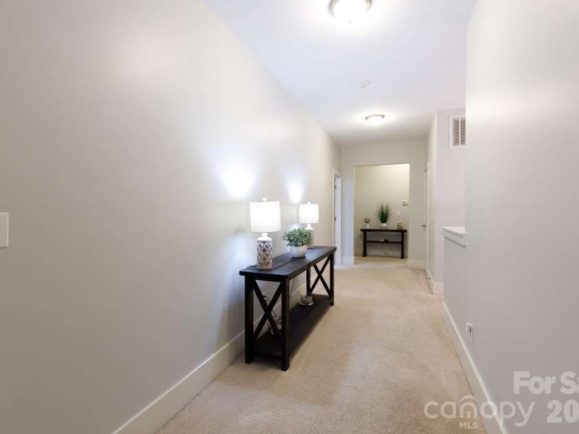 2172 Bluebell Way, Tega Cay, SC 29708.  MLS# CAR4354696, YatesRealty ID 16628. Large hallway upstairs