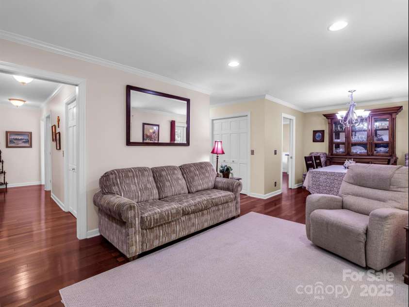 24 Middlemount Road, Pisgah Forest, NC 28768.  MLS# CAR4245556, YatesRealty ID 16634. Hall to left leads to bedrooms