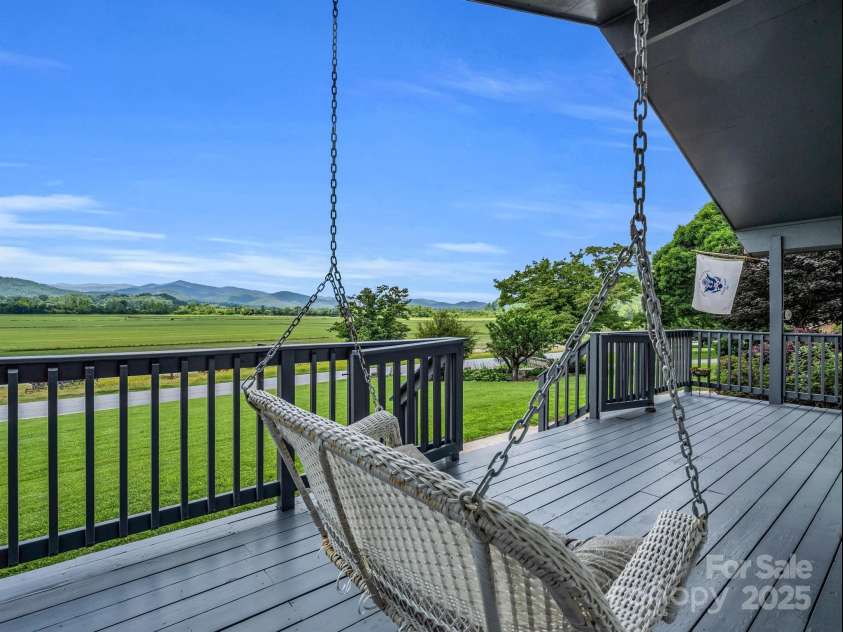 24 Middlemount Road, Pisgah Forest, NC 28768.  MLS# CAR4245556, YatesRealty ID 16634. Welcoming front porch
