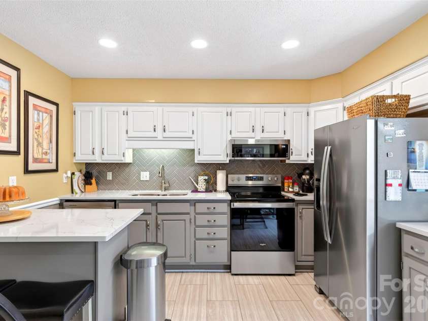 54 Deer Run Drive, Marion, NC 28752.  MLS# CAR4366901, YatesRealty ID 16636. Kitchen has easy to clean laminate flooring
